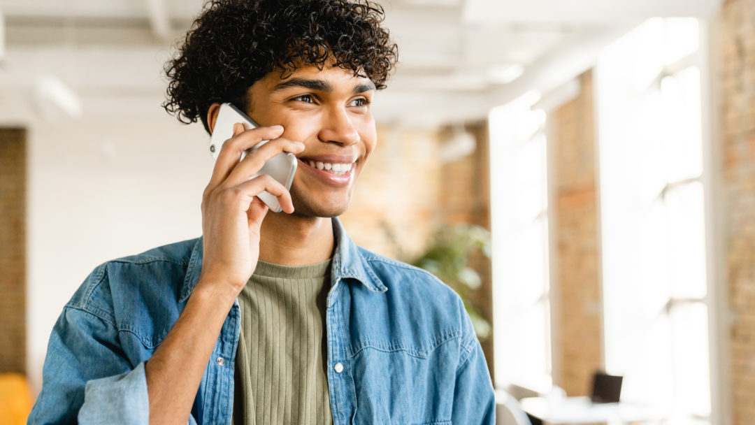man on the phone talking to a debt consolidation company