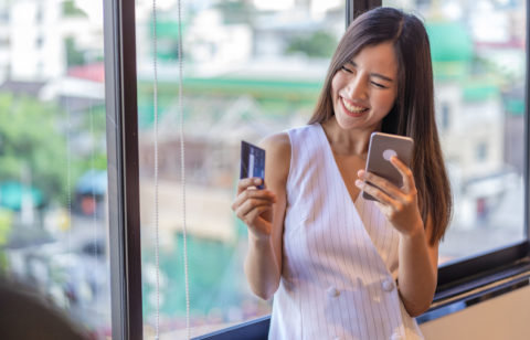 woman paying off credit card debt