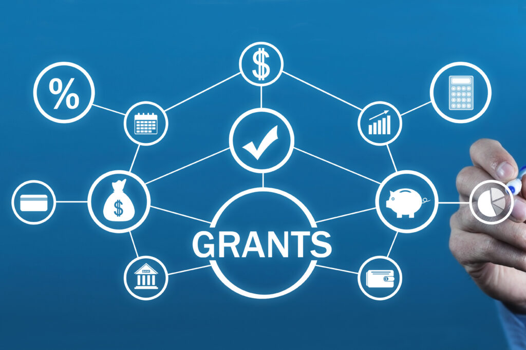 A digital diagram illustrating financial grants, with interconnected icons representing money, banking, interest rates, savings, and budgeting.