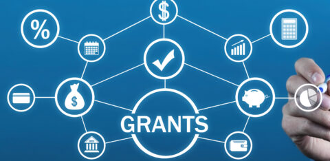 A digital diagram illustrating financial grants, with interconnected icons representing money, banking, interest rates, savings, and budgeting.