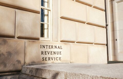 Exterior of the Internal Revenue Service building with engraved signage and classic stone architecture.