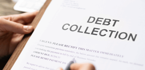 A person holds a clipboard with a document labeled “Debt Collection.”