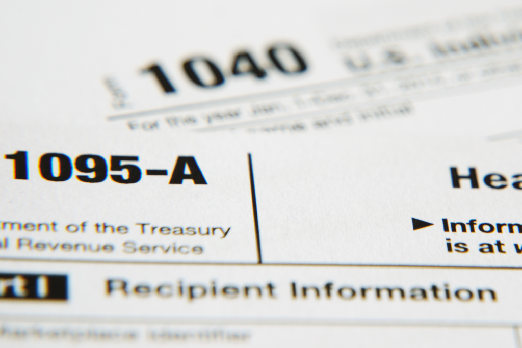 Close-up of IRS Form 1095-A with the title and tax form number visible.